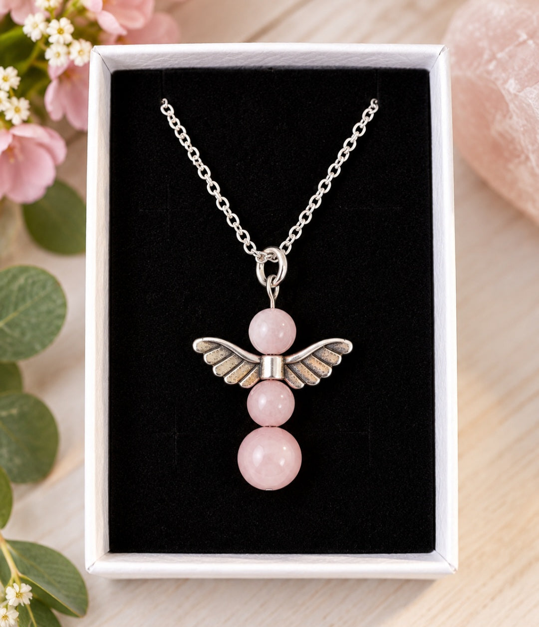 Rose quartz angel pendant