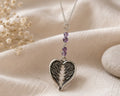 Amethyst and angelwings pendant