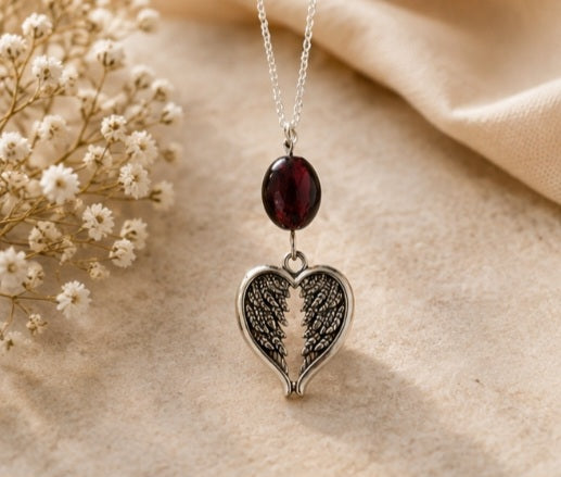 Wine, crafted glass and angel wings pendant