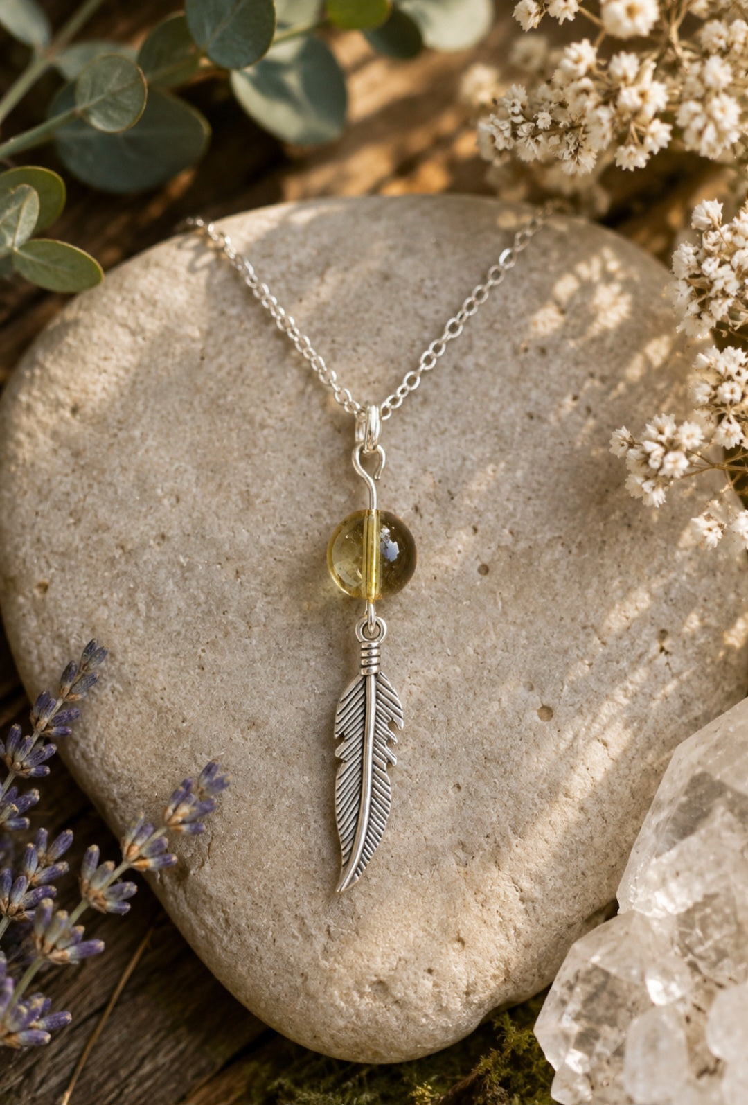 Citrine and feather pendant