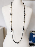 Long obsidian necklace with ceramic feature beads