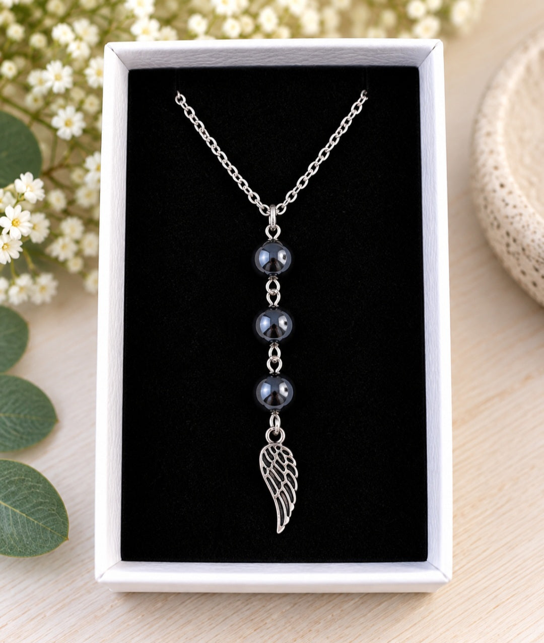 Hematite wing pendant