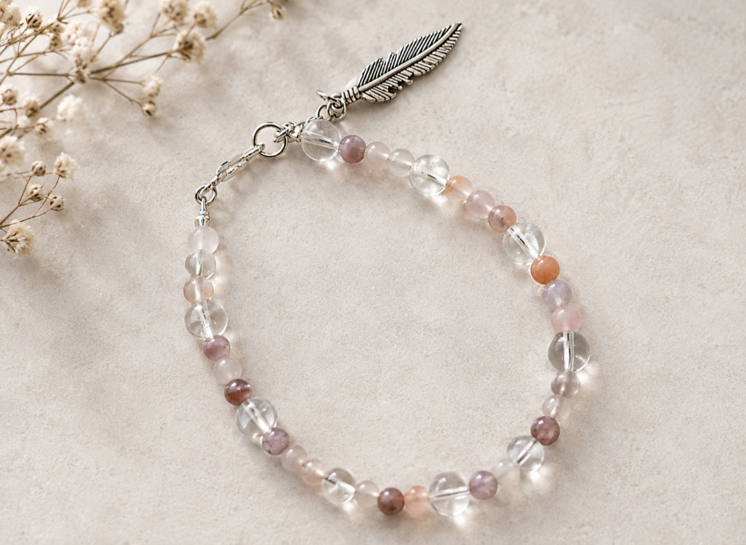 Clear quartz and agate bracelet with feather detail