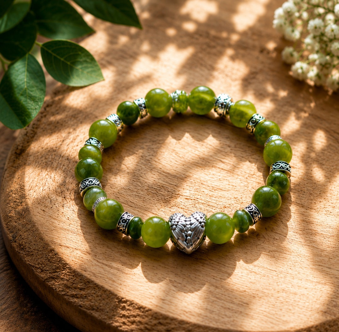 Peridot bracelet with angelwings feature