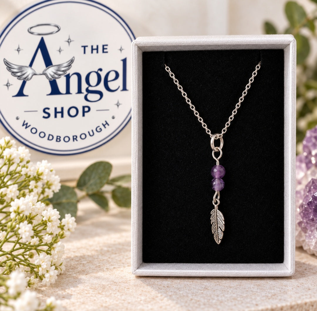 Amethyst and feather pendant