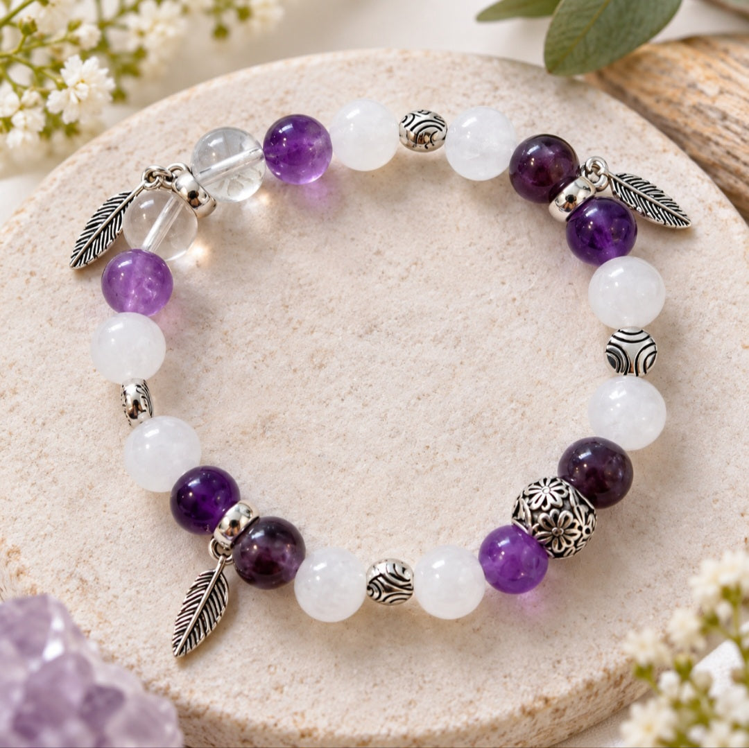 Amethyst & rose quartz bracelet with feather charms